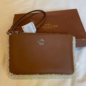 Coach Shearling Leather Wristlet